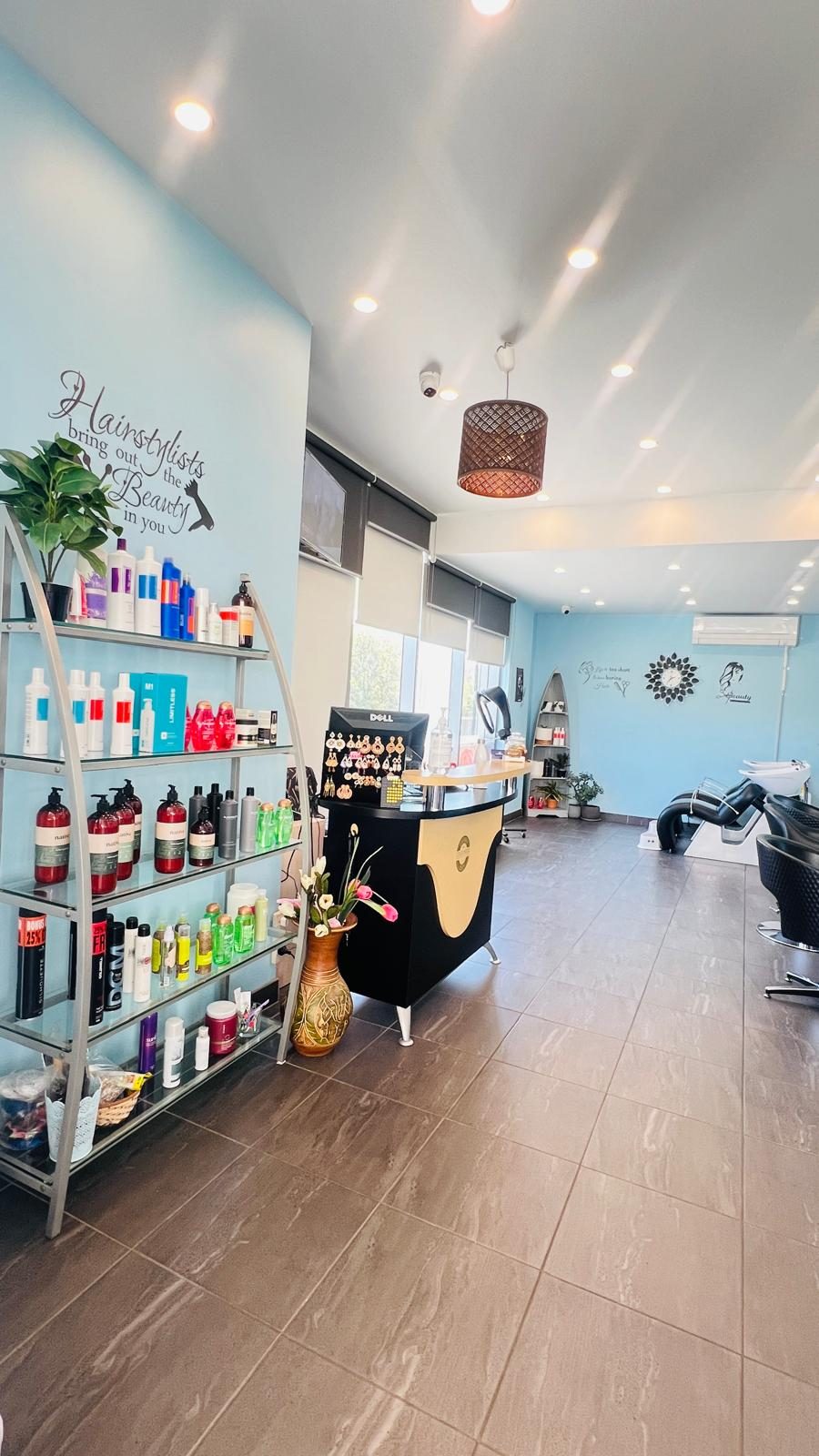 Reception desk and retail shelves at Lahana Hair and Beauty